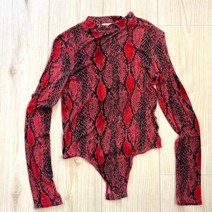Express size Medium pinkish/red snake skin bodysuit